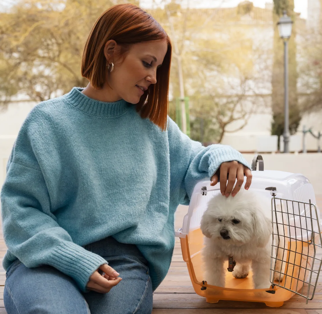 Owner with pet in carrier